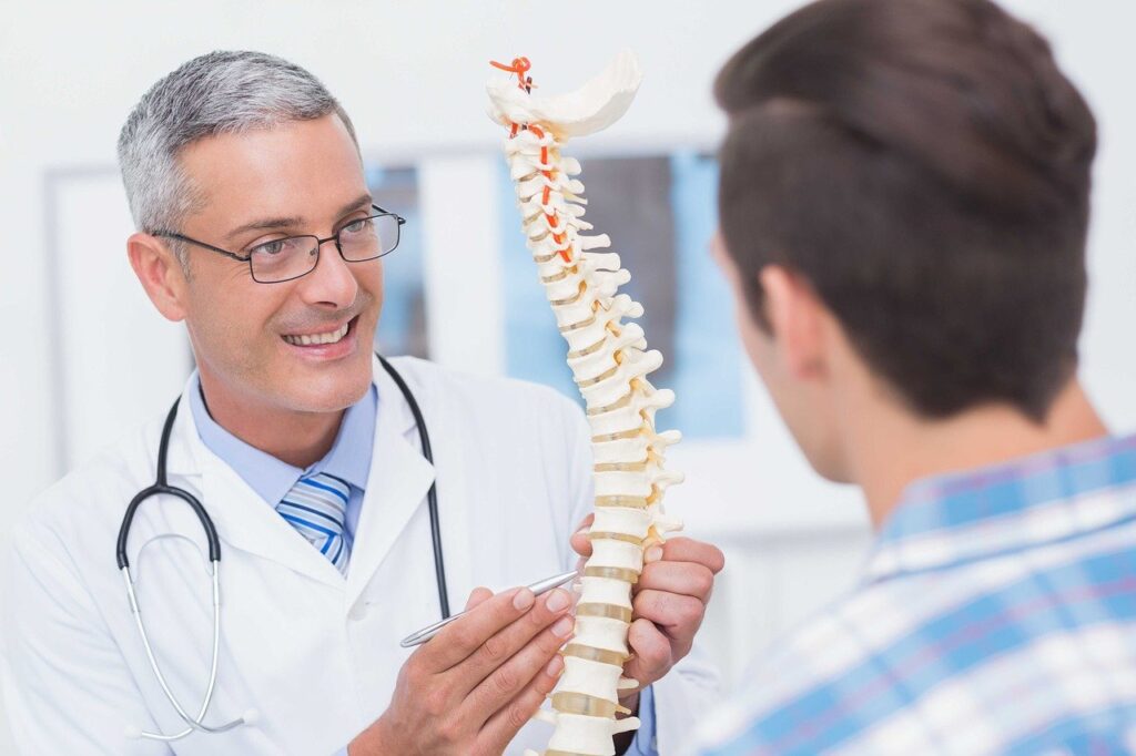 Débord discal : causes, symptômes et traitement